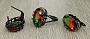 Комплект "Эльвира" фианит "турмалин"красно - зеленый, черная эмаль, размеры кольца: 17, 18, 19, 20