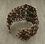 Браслет "Амира" под бронзу с гранеными вставками "изумруд"